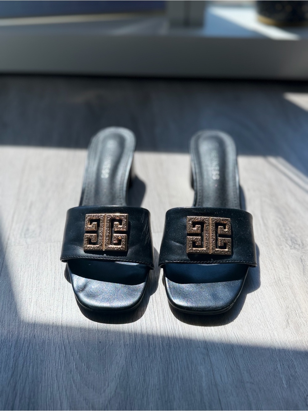 Fashion Nova Black Slide Mules with Gold Logo Accent